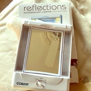 New in the box Conair Incandescent Lighted mirror